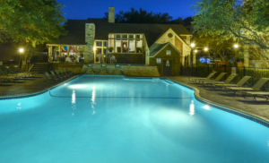 Pool in the evening with clubhouse